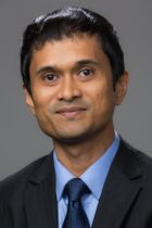 Dr. Mohammad Arifuzzaman a man in a suit posing for a picture