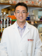 a man posing for a picture